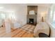 Bright living room with a cozy fireplace and stylish decor, perfect for entertaining at 4172 Deer Watch Dr, Castle Rock, CO 80104