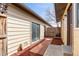 Cozy backyard with a sliding glass door and small, private patio area at 3512 S Kittredge St # A, Aurora, CO 80013