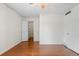 Bedroom featuring wood floors and ensuite walk in closet at 3512 S Kittredge St # A, Aurora, CO 80013