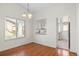 Bright dining area with window view and adjacent kitchen access at 3512 S Kittredge St # A, Aurora, CO 80013