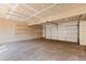 Clean, spacious garage with room for parking and storage, featuring built-in shelving at 3512 S Kittredge St # A, Aurora, CO 80013