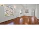 Bright living room with hardwood floors and ample natural light at 3512 S Kittredge St # A, Aurora, CO 80013
