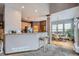 Open concept kitchen flows to the dining room, perfect for entertaining at 8426 W 97Th Pl, Broomfield, CO 80021