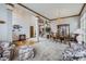 Spacious living space with great flow between living room and dining room, perfect for entertaining guests at 8426 W 97Th Pl, Broomfield, CO 80021