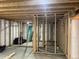 Unfinished basement shows the framing of a room with insulation between the framing studs at 4995 S Algonquian Way, Aurora, CO 80016