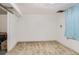A basic unfurnished bedroom with carpet and a window at 1101 Dakin St, Denver, CO 80221