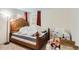 Bedroom with a queen bed and lots of miscellaneous items around the room at 1101 Dakin St, Denver, CO 80221