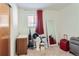 Standard bedroom with carpet and one window to provide natural light at 1101 Dakin St, Denver, CO 80221