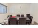 Spacious dining room featuring a modern dark wood table and chairs, providing a comfortable dining space at 1101 Dakin St, Denver, CO 80221