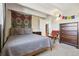 Cozy bedroom with unique decor and lots of natural light at 33 N Corona St # 404, Denver, CO 80218
