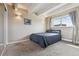 Bedroom featuring plush carpet, ample light, and neutral wall color at 33 N Corona St # 404, Denver, CO 80218