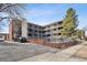 A modern building with multiple balconies and external stairwells, offering urban living at 33 N Corona St # 404, Denver, CO 80218