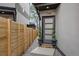 Charming entrance with decorative plants and a modern front door at 1745 Lowell Blvd, Denver, CO 80204