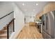 Bright, open-concept kitchen with stainless steel appliances and modern finishes at 1745 Lowell Blvd, Denver, CO 80204