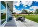 Relaxing backyard patio with seating area perfect for enjoying the outdoors at 1853 Burton St, Strasburg, CO 80136