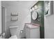Bathroom featuring a vanity with marble countertop and updated fixtures at 17004 E Tennessee Dr # 103, Aurora, CO 80017