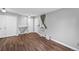 Bright living room with hardwood floors, a small fireplace and large windows at 17004 E Tennessee Dr # 103, Aurora, CO 80017