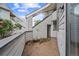 A view of a condominium patio with access and privacy at 17004 E Tennessee Dr # 103, Aurora, CO 80017