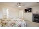 Bright bedroom with ensuite bathroom access and ample closet space at 21837 E Stanford Cir, Aurora, CO 80015