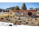 Community entrance sign with landscaping and pathway at 21837 E Stanford Cir, Aurora, CO 80015