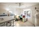 Spacious craft room with built-in cabinetry and a large work table at 21837 E Stanford Cir, Aurora, CO 80015