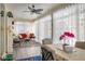 Sunroom with comfortable seating and large windows at 21837 E Stanford Cir, Aurora, CO 80015