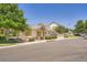 View of the clubhouse and pool area surrounded by beautiful trees and well-maintained landscaping at 22560 E Ontario Dr # 204, Aurora, CO 80016