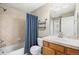Updated bathroom featuring a shower-tub combination, storage shelving, and vanity with single bowl sink at 3760 Ute Mountain Trl, Castle Rock, CO 80109