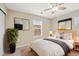 Relaxing bedroom with a soft bed, ample natural light, and a modern design at 3760 Ute Mountain Trl, Castle Rock, CO 80109