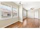 Bright dining area adjacent to the living room with hardwood floors and natural light at 3760 Ute Mountain Trl, Castle Rock, CO 80109