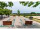 Outdoor horseshoe pit with benches surrounded by green grass, trees, and sports fields at 3760 Ute Mountain Trl, Castle Rock, CO 80109