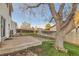 Large backyard with a concrete patio and wood fence at 5155 E 108Th Pl, Thornton, CO 80233