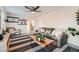 Inviting living room with modern furniture and a cozy atmosphere, perfect for relaxing at 5155 E 108Th Pl, Thornton, CO 80233