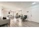 Spacious living room featuring stylish decor, hardwood floors, and an open layout at 5155 E 108Th Pl, Thornton, CO 80233