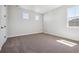 Neutral bedroom with carpet, white walls, natural light and a minimalist aesthetic at 4949 Hickory Oaks St, Castle Rock, CO 80104