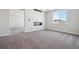 Bedroom with a fireplace, carpet, and ample natural light with an adjacent room at 4949 Hickory Oaks St, Castle Rock, CO 80104