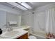 Bathroom with shower-tub combination, functional sink, and neutral color scheme at 3030 W Prentice Ave # G, Littleton, CO 80123