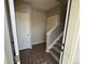 Tiled entrance with stairway and doors, providing a warm welcome at 13013 Grant Cir # C, Thornton, CO 80241
