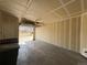 Spacious unfinished one-car garage interior, ready for customization and storage solutions at 13013 Grant Cir # C, Thornton, CO 80241