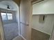 Hallway leads to bedroom and closet, features include neutral walls, plush carpeting, and plenty of light at 13013 Grant Cir # C, Thornton, CO 80241
