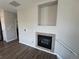 Living room featuring a modern fireplace and lots of room for decorations, plenty of space for entertaining at 13013 Grant Cir # C, Thornton, CO 80241