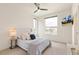 Bright bedroom with a view and white decor at 5668 Galena St, Denver, CO 80238