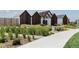 Modern community building with unique architectural details and lush landscaping at 5668 Galena St, Denver, CO 80238