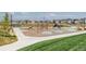 Modern playground with climbing structures and soft play surfaces in a Gathering-friendly neighborhood at 5668 Galena St, Denver, CO 80238
