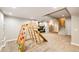 Finished basement with play area, stairs, and views to another bedroom at 11437 Tomichi Dr, Franktown, CO 80116