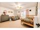 Charming bedroom featuring two twin beds, a ceiling fan, and a decorative dresser at 11437 Tomichi Dr, Franktown, CO 80116