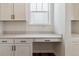 Cozy kitchen area with a desk space and plenty of natural light at 25284 E Warren Pl, Aurora, CO 80018