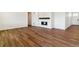 Comfortable living area with hardwood floors and a fireplace for cozy evenings at 25284 E Warren Pl, Aurora, CO 80018