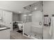 Modern bathroom features a glass-enclosed shower, freestanding tub, and elegant fixtures and decor at 280 E 11Th Ave, Broomfield, CO 80020