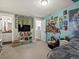 Bright bedroom features a playful wall decor, ivy vines, and comfortable beanbag seating at 280 E 11Th Ave, Broomfield, CO 80020